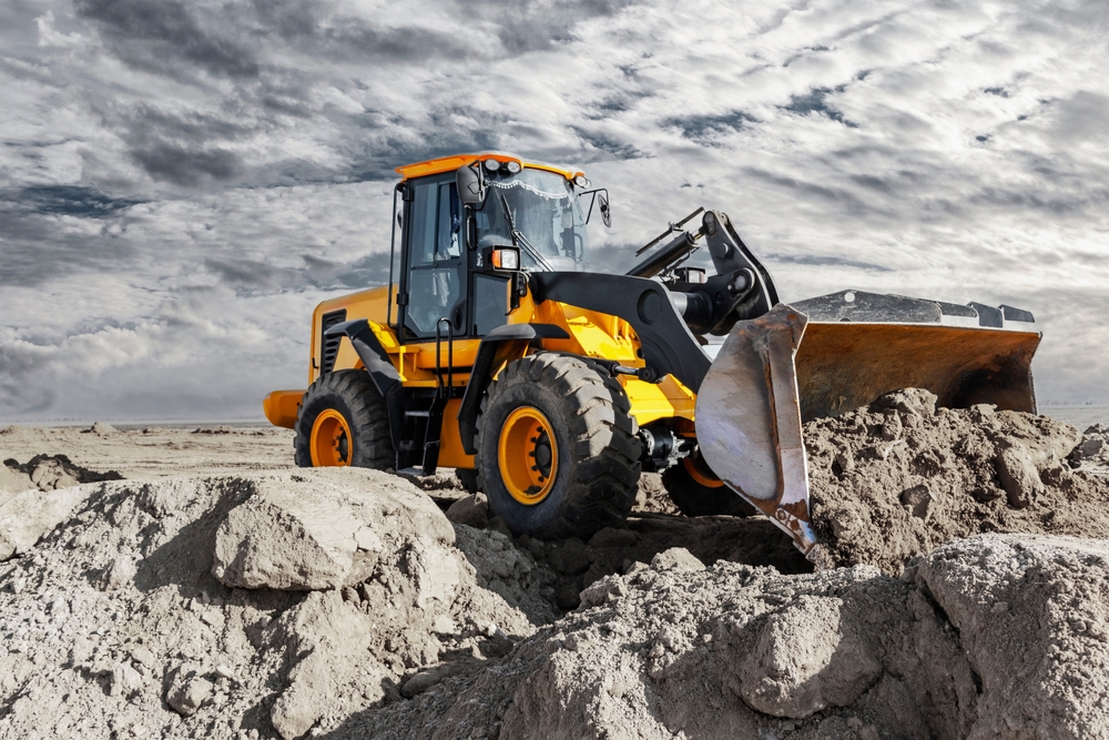 Bulldozer,Or,Loader,Moves,The,Earth,At,The,Construction,Site